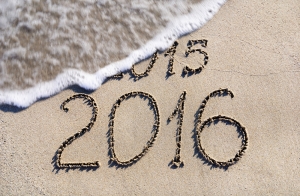 Happy New Year 2016 replace 2015 concept on the sea beach